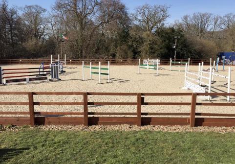 Showjumps set up in the outdoor arena